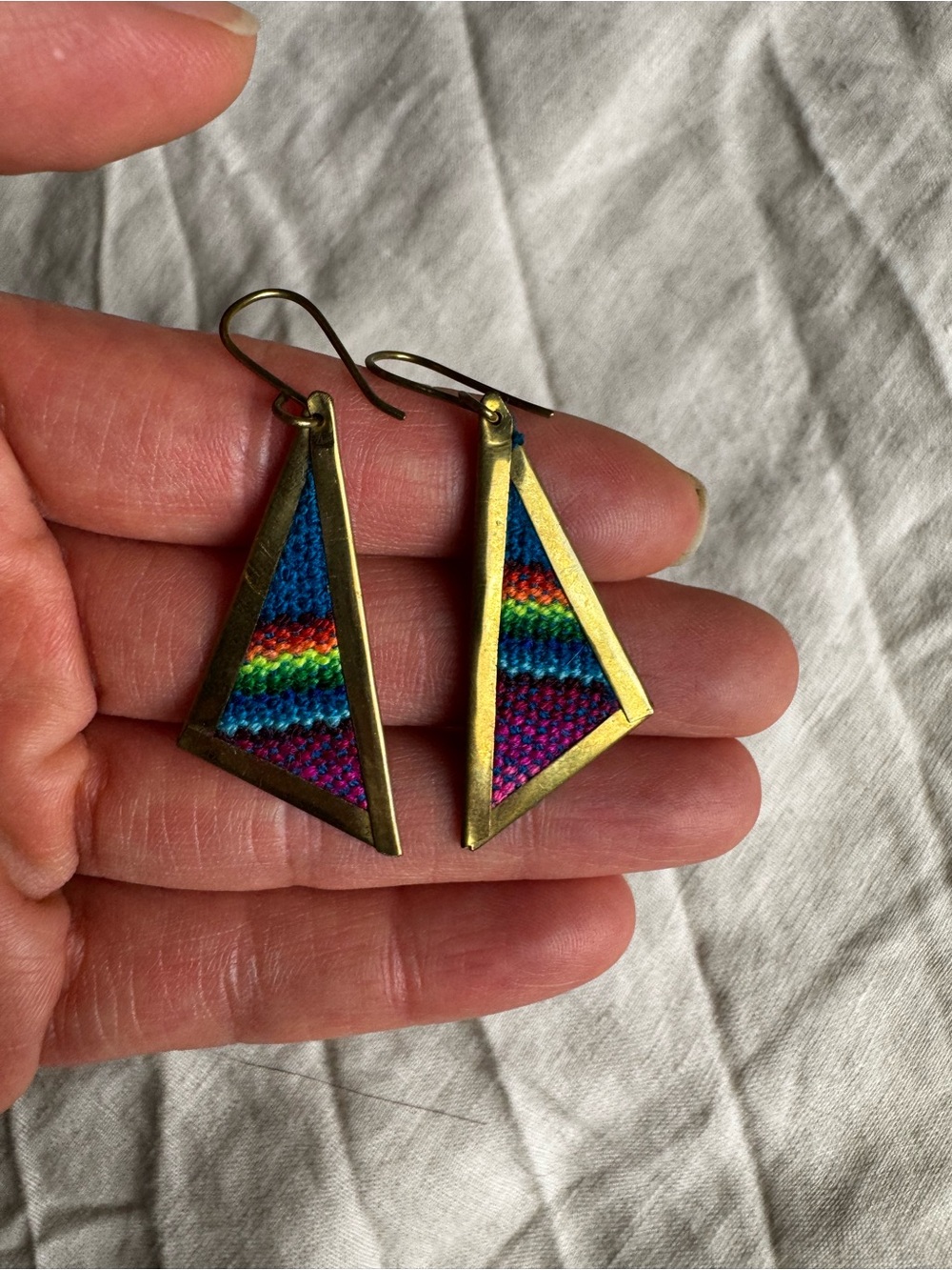 Handmade brass and woven rainbow earrings from Kenya
